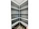 Walk-in pantry with multiple shelves at 32101 W Palo Verde St, Wittmann, AZ 85361