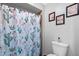 Bright bathroom featuring a charming cactus and llama themed shower curtain at 34 Leisure World --, Mesa, AZ 85206