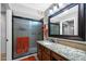 Bathroom featuring granite counters and a sliding glass shower door at 34 Leisure World --, Mesa, AZ 85206
