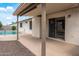 Covered back patio with a view of the pool and backyard at 3407 E Pueblo Ave, Mesa, AZ 85204