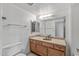 Bathroom featuring granite countertops, a commode, and white walls at 3407 E Pueblo Ave, Mesa, AZ 85204
