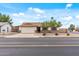 Exterior view of single Gathering home featuring desert landscaping and attached garage at 3407 E Pueblo Ave, Mesa, AZ 85204