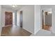 Inviting foyer featuring wood-look flooring and a view to the entrance and rooms beyond at 3407 E Pueblo Ave, Mesa, AZ 85204