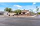 Charming single-story home with manicured front yard, desert landscaping, and attached garage at 3407 E Pueblo Ave, Mesa, AZ 85204