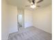 Spacious carpeted bedroom with closet and entrance to hall at 350 N Florence St, Florence, AZ 85132