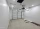 Spacious garage with an automatic door and lighting at 350 N Florence St, Florence, AZ 85132