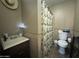 This is a standard bathroom with a shower and vanity at 3806 N 80Th Dr, Phoenix, AZ 85033