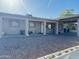 Charming home exterior showcasing a covered carport and desert landscaping at 3806 N 80Th Dr, Phoenix, AZ 85033