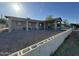 Charming single-story home with a covered parking and desert landscaping in the front yard at 3806 N 80Th Dr, Phoenix, AZ 85033