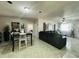 Open floor plan seamlessly connects the dining area and cozy living room at 3806 N 80Th Dr, Phoenix, AZ 85033