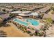 Aerial view showcasing the community pool area and neighborhood at 4202 E Broadway Rd # 40, Mesa, AZ 85206