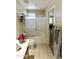Neutral bathroom with tiled floors, functional shower, and towel rack at 4202 E Broadway Rd # 40, Mesa, AZ 85206