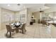 Open floor plan with eat-in dining, tile floors, and a living room view that features a fireplace at 4202 E Broadway Rd # 40, Mesa, AZ 85206