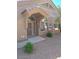 Inviting front entrance with an arched covering, well maintained landscaping and beautiful windows at 4202 E Broadway Rd # 40, Mesa, AZ 85206