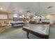 Recreation room with multiple pool tables, task lighting, and seating at 4202 E Broadway Rd # 40, Mesa, AZ 85206
