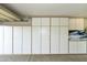 Great garage with lots of built in storage cabinets for tools, decorations, etc at 4202 E Broadway Rd # 40, Mesa, AZ 85206