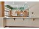 Spacious kitchen area featuring wooden cabinets, modern appliances, and ample counter space at 4202 E Broadway Rd # 40, Mesa, AZ 85206