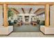 The lounge area features comfortable seating, a fireplace, shelving and natural lighting at 4202 E Broadway Rd # 40, Mesa, AZ 85206
