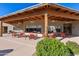 Expansive patio area with ample seating beneath an attractive wood canopy, ideal for gatherings and relaxation at 4202 E Broadway Rd # 40, Mesa, AZ 85206