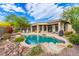 Backyard with pool featuring rock detail, landscaping, outdoor seating and BBQ area at 42102 N Long Cove Way, Phoenix, AZ 85086