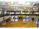 Spacious indoor basketball court with a view of the fitness center at 42102 N Long Cove Way, Phoenix, AZ 85086
