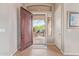 Open entryway with a view of the landscaped front yard through the front gate at 42102 N Long Cove Way, Phoenix, AZ 85086