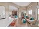 Open-concept kitchen and living area with a seamless flow for easy entertaining at 42102 N Long Cove Way, Phoenix, AZ 85086