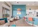Open-concept living and dining space showcasing stylish seating and seamless kitchen access at 42102 N Long Cove Way, Phoenix, AZ 85086