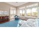 Inviting primary bedroom with serene views, a ceiling fan, and a cozy sitting area at 42102 N Long Cove Way, Phoenix, AZ 85086