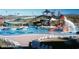 Community waterpark area with slides and splash pad for Gathering-friendly fun in the sun at 42102 N Long Cove Way, Phoenix, AZ 85086