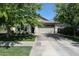 Charming single-story home with well-maintained landscaping and a spacious two-car garage at 4336 E Mesquite St, Gilbert, AZ 85296