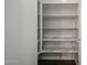 Walk-in pantry featuring several shelves with decorative marble-patterned shelf liner at 4336 E Mesquite St, Gilbert, AZ 85296