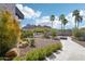 Landscaped front yard with native plants, desert landscaping, and mountain views, creating an inviting entrance at 4502 E Solano Dr, Phoenix, AZ 85018