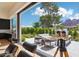 Covered outdoor patio with comfortable seating, a fire pit, and scenic views, ideal for relaxing at 4502 E Solano Dr, Phoenix, AZ 85018