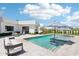 Beautiful backyard oasis featuring a sparkling pool, jacuzzi, and modern patio furniture for luxurious outdoor living at 4502 E Solano Dr, Phoenix, AZ 85018