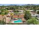 Aerial view of a home featuring a backyard pool and lush landscaping at 4840 E Sunnyside Dr, Scottsdale, AZ 85254