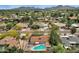 Aerial view of a home featuring a private pool and mature landscaping at 4840 E Sunnyside Dr, Scottsdale, AZ 85254