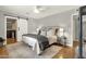 Spacious bedroom includes a walk-in closet with a sliding door, enhancing functionality and style at 4840 E Sunnyside Dr, Scottsdale, AZ 85254