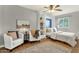 Inviting bedroom showcases a murphy bed, seating area with armchairs, and stylish decor for a versatile living space at 4840 E Sunnyside Dr, Scottsdale, AZ 85254