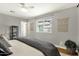Bright bedroom showcasing modern decor, a window, and a peaceful ambiance at 4840 E Sunnyside Dr, Scottsdale, AZ 85254