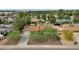 Charming single-story home with a well-maintained yard and a paved driveway at 4840 E Sunnyside Dr, Scottsdale, AZ 85254