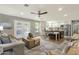Bright, airy living space featuring an open layout, kitchen with island, and comfortable seating area with stylish décor at 4840 E Sunnyside Dr, Scottsdale, AZ 85254
