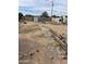 Exterior view of the spacious backyard with a stone-lined path at 509 W 12Th St, Casa Grande, AZ 85122