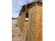 Exterior view of a home under construction, featuring stud framing and plywood siding at 509 W 12Th St, Casa Grande, AZ 85122