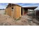 Exterior view of a home during the construction phase, showcasing the wooden stud frame and siding at 509 W 12Th St, Casa Grande, AZ 85122
