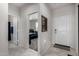 Open entryway with tile floors leading to a bedroom and featuring a modern front door at 5146 E Diatomite Dr, San Tan Valley, AZ 85143