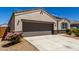 Attractive single-story home with desert landscaping and a spacious driveway at 5146 E Diatomite Dr, San Tan Valley, AZ 85143