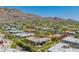 Aerial view of a luxurious property, showcasing its well-manicured landscaping and mountain views at 5434 E Lincoln Dr # 58, Paradise Valley, AZ 85253