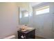 Contemporary bathroom featuring a sleek vanity, glass shower, and modern fixtures at 5434 E Lincoln Dr # 58, Paradise Valley, AZ 85253
