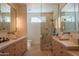 Modern bathroom featuring dual sinks, a glass shower, and contemporary fixtures at 5434 E Lincoln Dr # 58, Paradise Valley, AZ 85253